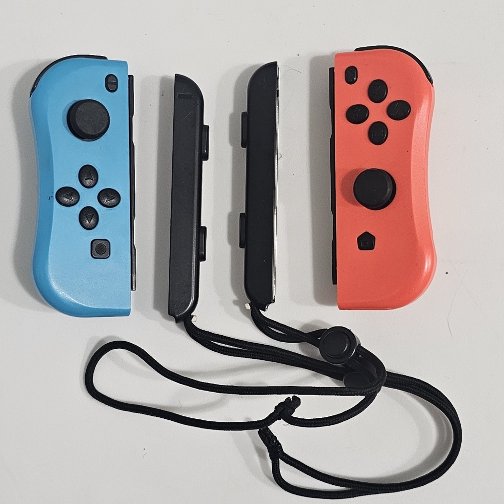 OEM Official Nintendo Switch Joy-Con Controller Pair (L/R)- Red/Blue Set
